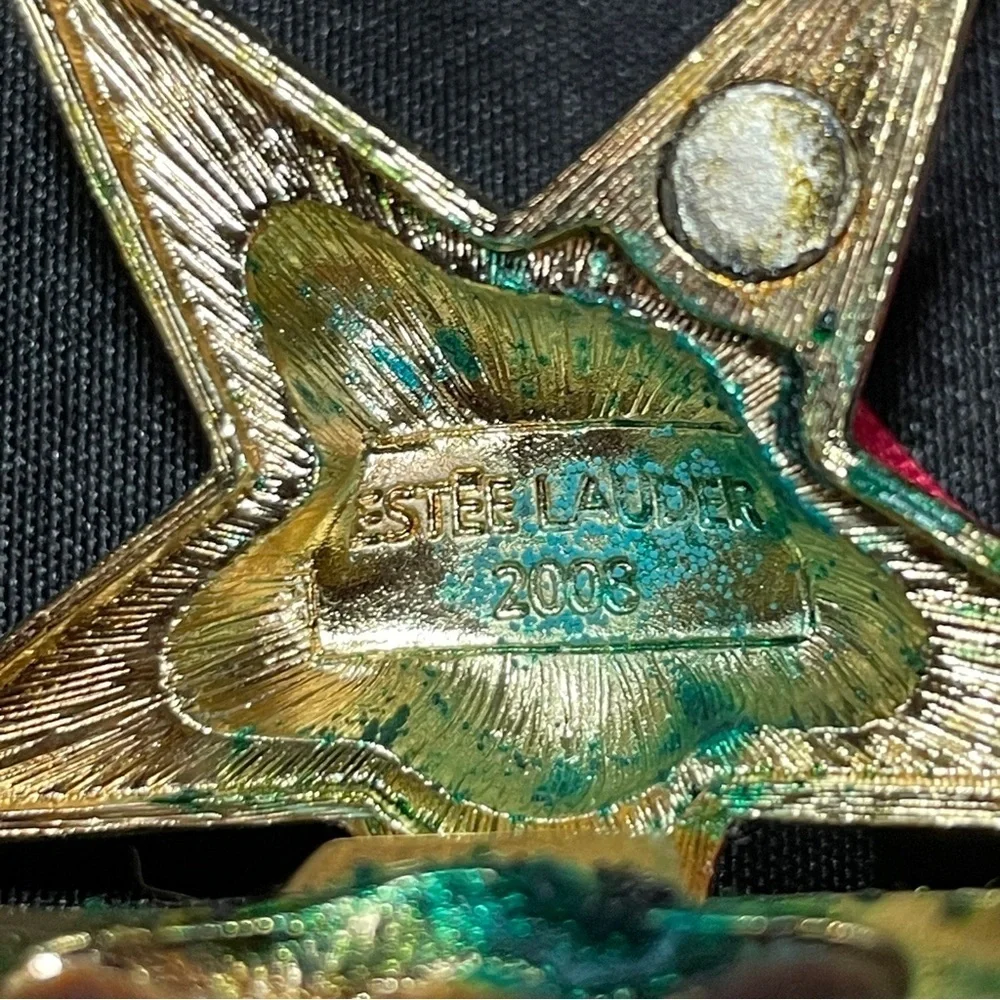 Estee Lauder Gold Holiday Ornament Star